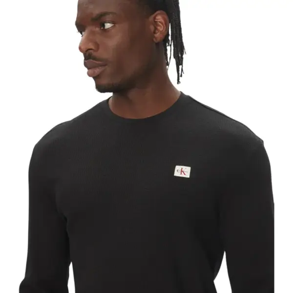 Calvin Klein - Ανδρικό Πουλόβερ Badge Waffle LS Tofu LV040EM217-UB1 Μαύρο LV040EM217-UB1