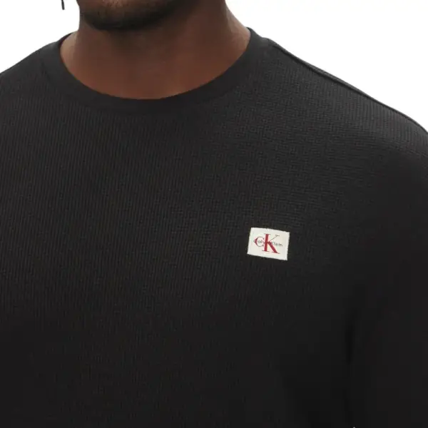 Calvin Klein - Ανδρικό Πουλόβερ Badge Waffle LS Tofu LV040EM217-UB1 Μαύρο LV040EM217-UB1