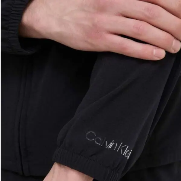 Calvin Klein - Ανδρικό Μεταβατικό Μπουφάν Performance Regular Fit 00GMS4O520-BAE Μαύρο 00GMS4O520-BAE