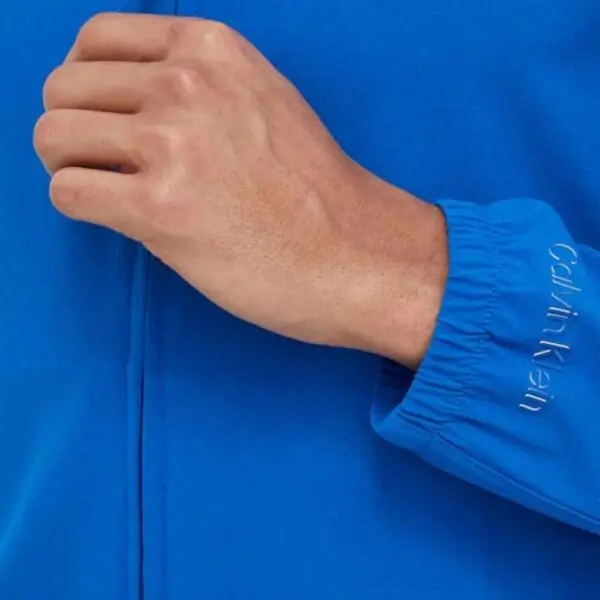 Calvin Klein - Ανδρικό Μεταβατικό Μπουφάν Performance Regular Fit 00GMS4O520-CGN Μπλε 00GMS4O520-CGN