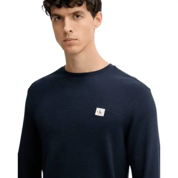 Calvin Klein - Ανδρικό Πουλόβερ Badge Waffle LS Tofu LV040EM217-WFW Μπλε Σκούρο LV040EM217-WFW